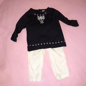 Carter’s black and white outfit